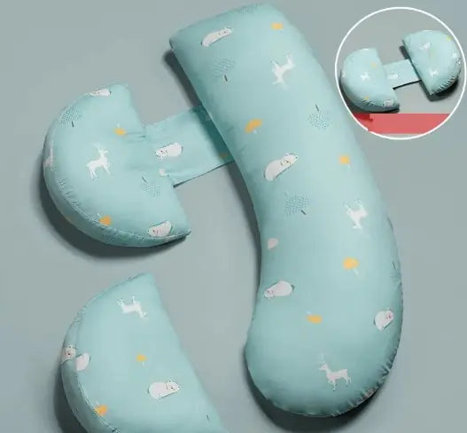 Maternity pillow with unicorn pattern on a gray background