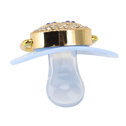 HerPillow Diamond Baby Bling Pacifier, designed for infants aged 6 to 18 months, offers a soft-touch silicone design. This anti-static newborn pacifier, suitable for home use, is available in blue. HerPillow.store